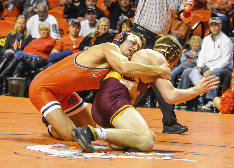 ‘A dream come true’: Father of Cowboy wrestler traveled cross country to witness home debut